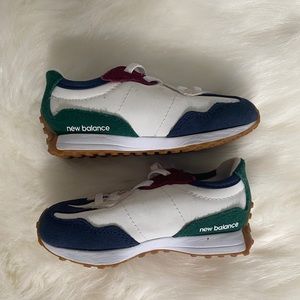 Toddler New Balance. Size 8. Colors: white, navy, green, orange, maroon